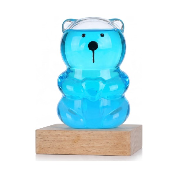 Bouřkové sklo Storm Glass ve tvaru medvídka 11,5 x 8 cm Skleněný barometr s krystaly na dřevěném podstavci Dekorace modrá