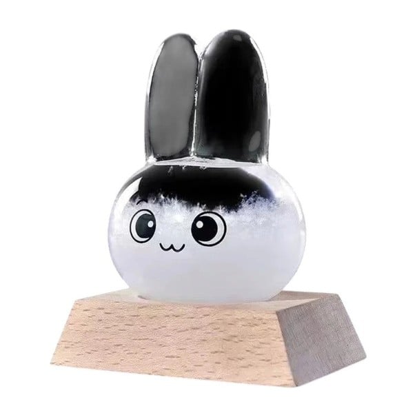 Bouřkové sklo Storm Glass ve tvaru zajíčka 8 x 13,5 cm Skleněný barometr s krystaly Dřevěný podstavec Dekorace na stůl černá