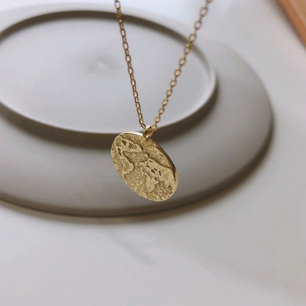 Damhalsband med klot och kompass 1
