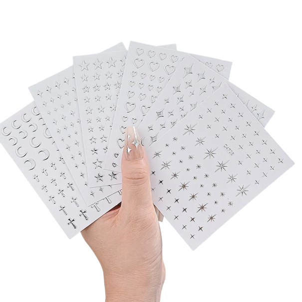 6 ark av metalliska silverfärgade nagelklistermärken 3D stjärnor, månar, kors, hjärtan, metalliska dekaler, manikyr, nagelkonst 1