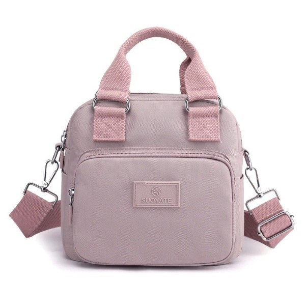 Damtextilväska för hand och över axeln 22 x 20 x 13 cm Avtagbar justerbar rem Främre fack med dragkedja Nylon och polyester ljuslila