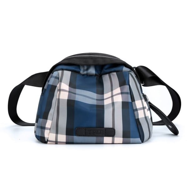Damsväska över axeln med rutigt mönster Rundad form med dragkedja Svart bred rem Nylon med polyester Mått 24 x 17 x 14 cm blå