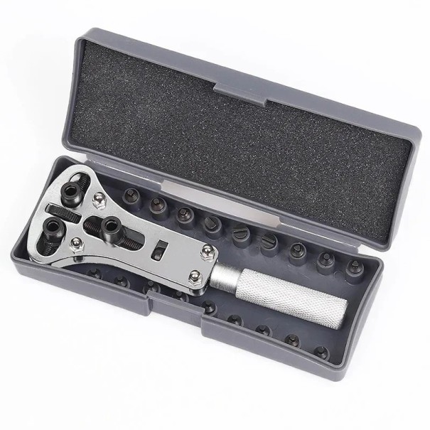 Abridor de cajas de relojes profesional con 3 mordazas y 18 accesorios en un estuche protector para servicio y reemplazo de batería. gris