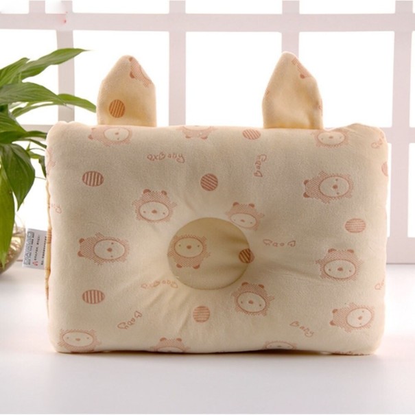Almohada infantil con orejas crema