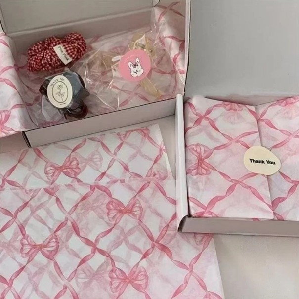 Balicí papír s motivem růžových mašlí 50×35 cm hedvábný papír růžový na balení dárků, květin a dekorace 1