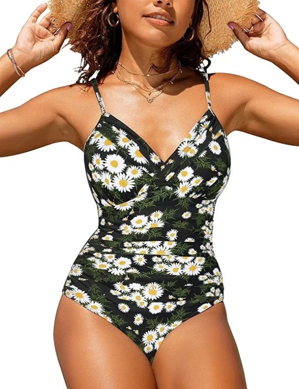 Bañador de mujer de una pieza, color negro con flores blancas, escote cruzado, corte moldeador, fruncido en los laterales, tirantes ajustables. S
