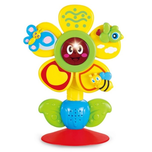 Barn leger med en blomst 1