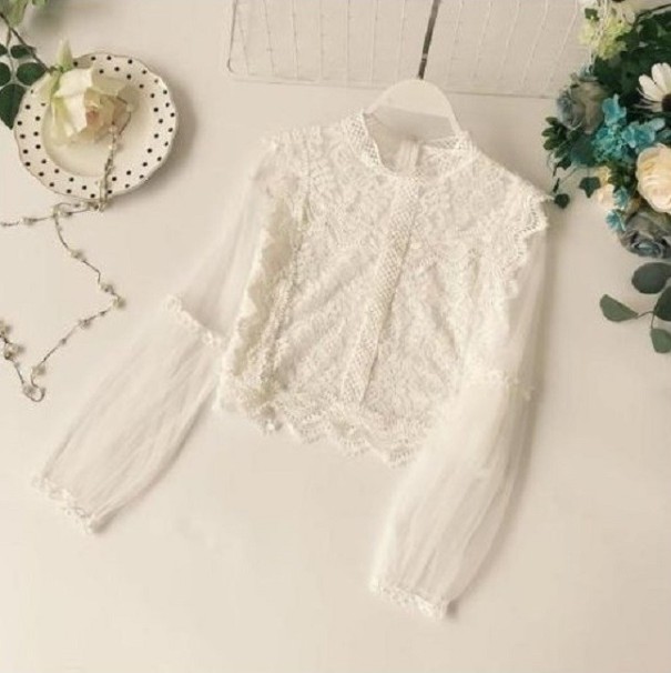 Blouse femme avec des manches transparentes blanc