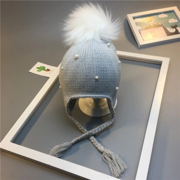 Børnehue med pompon og perler grå