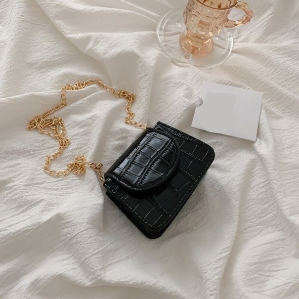 Borsa mini da donna con motivo in pelle di serpente nero