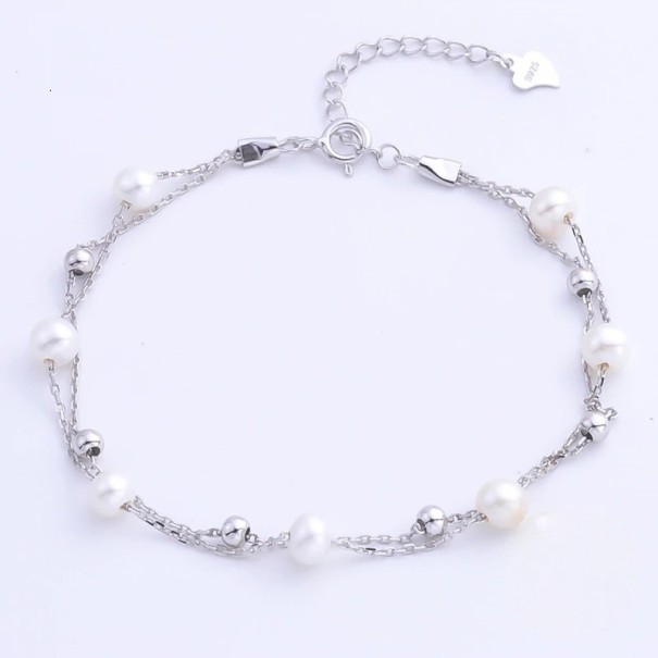 Bracciale da donna con palline e perle 1