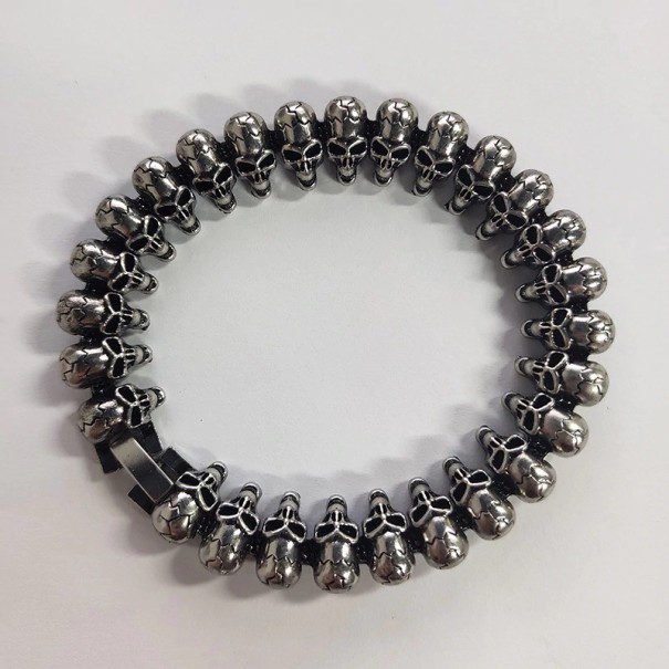 Bracciale da uomo con teschi H408 1
