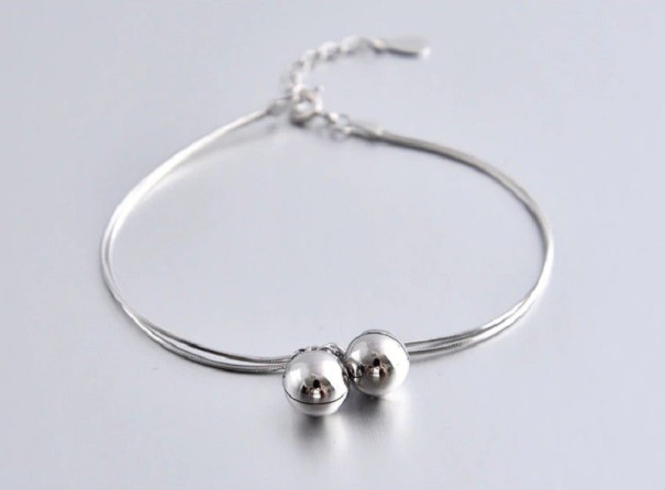 Bracelet féminin avec grelots H420 1