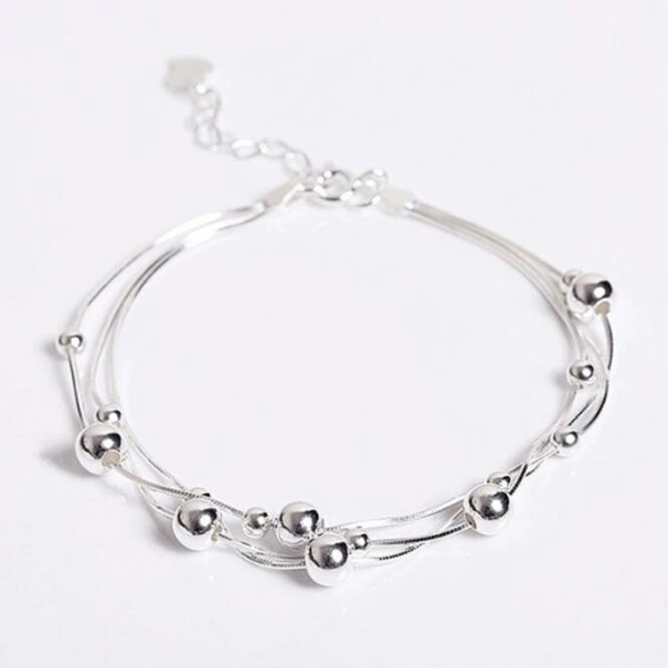Bracelet femme avec perles P135 1