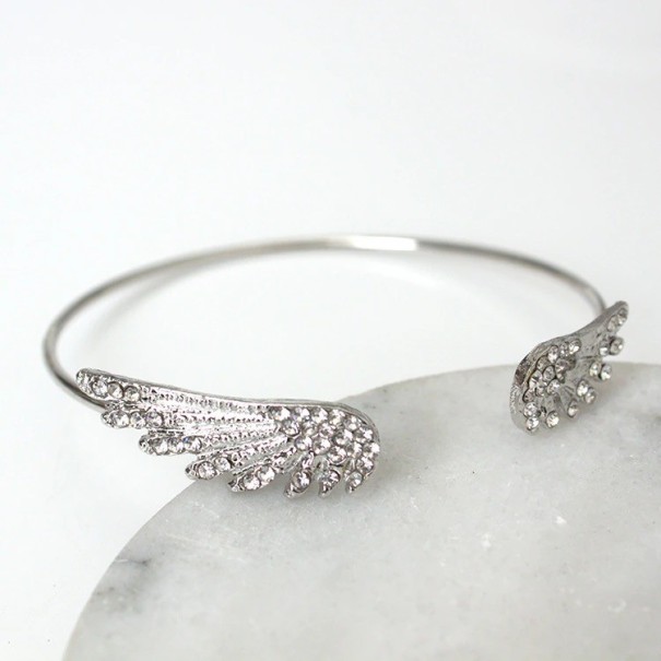 Bracelet ouvert pour femme avec des ailes 1