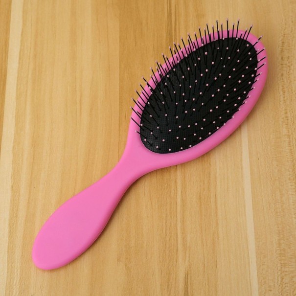 Brosse à cheveux colorée rose