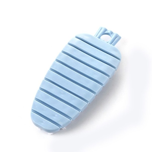 Brosse à légumes bleu clair