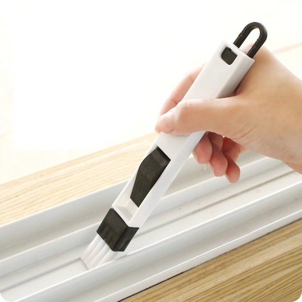 Brosse de nettoyage pour la maison noir