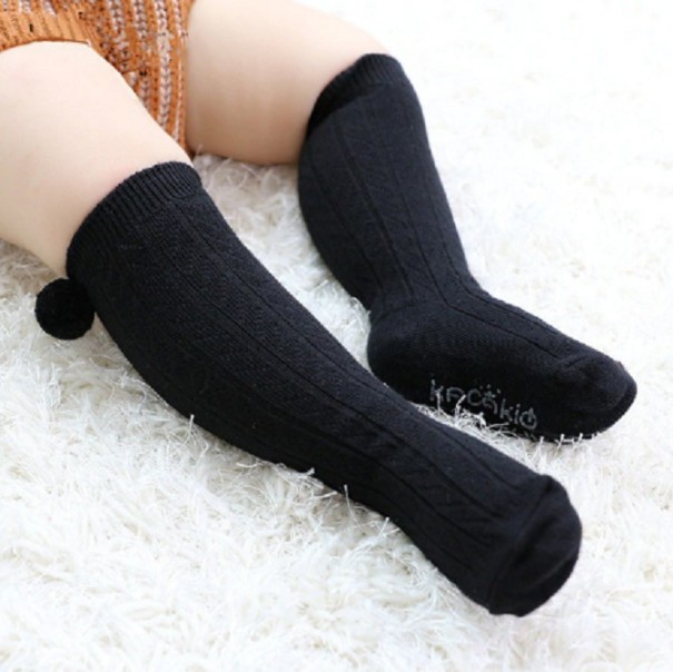 Calcetines infantiles con pompón negro 0-2 años