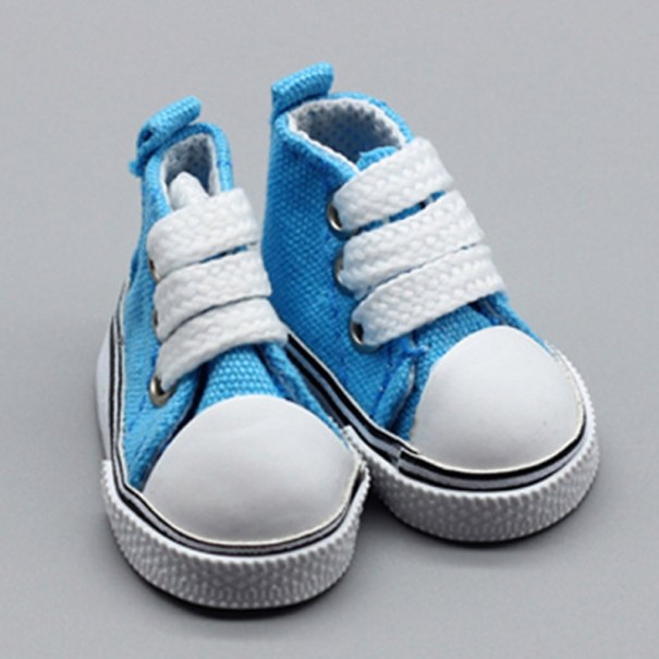 Canvas schoenen voor een pop blauw