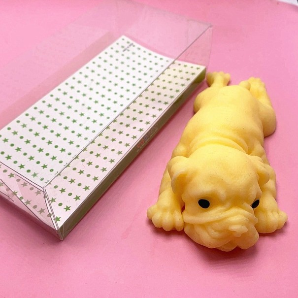 Cão de apertar amarelo