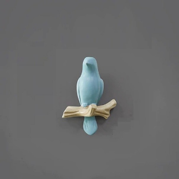 Cârlig decorativ în formă de pasăre albastru deschis