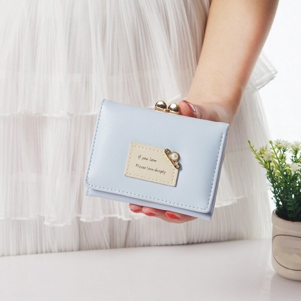 Cartera de mujer con cita azul claro