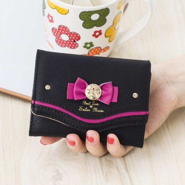 Cartera infantil con lazo negro