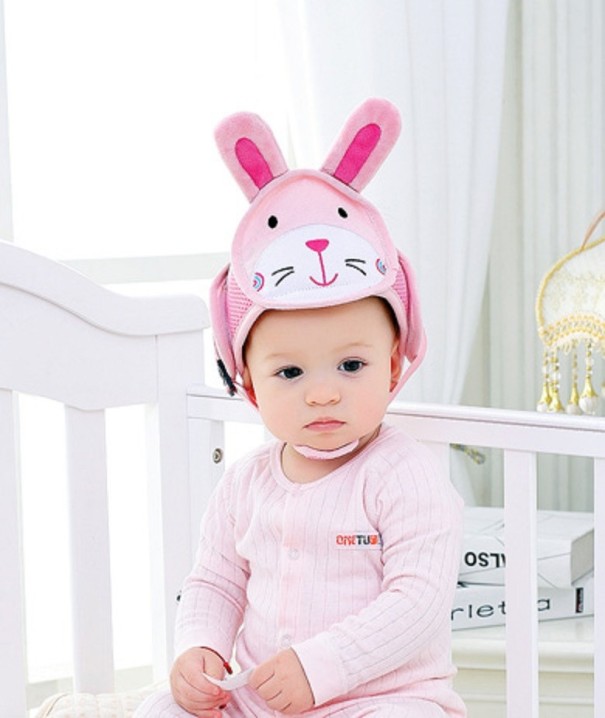 Casco protector infantil con animal rosa