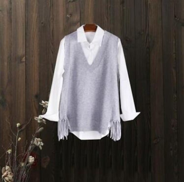 Chaleco de punto de mujer con flecos gris