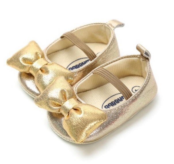 Chaussons pour filles avec un nœud doré 6-12 mois