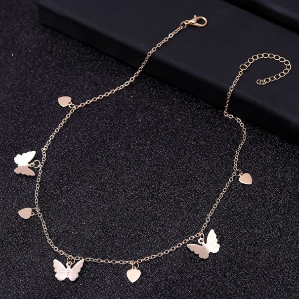 Collana da donna con farfalle e cuori oro