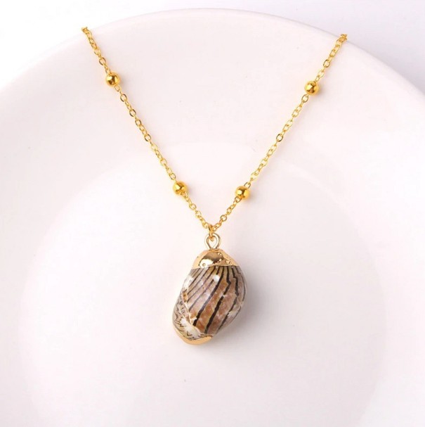 Collana da donna con palline e conchiglie 4