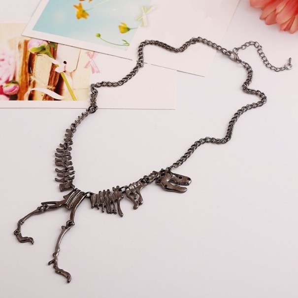 collar de dinosaurio bronce