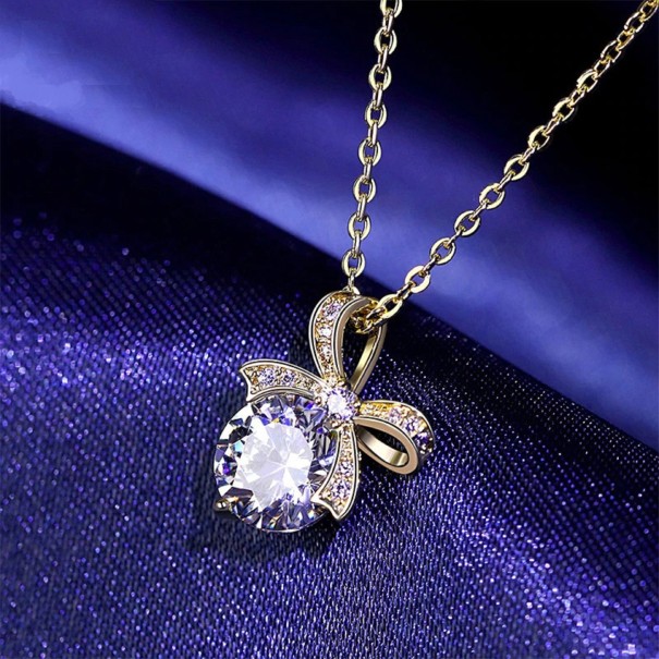 Collar de mujer con lazo dorado
