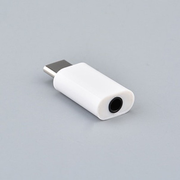 Compact USB-C to 3.5 mm jack adapter without a cable for connecting wired headphones to your phone or tablet Direct plug-in to the port white