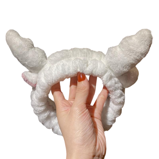 Cosmetische hoofdband met hoorns wit
