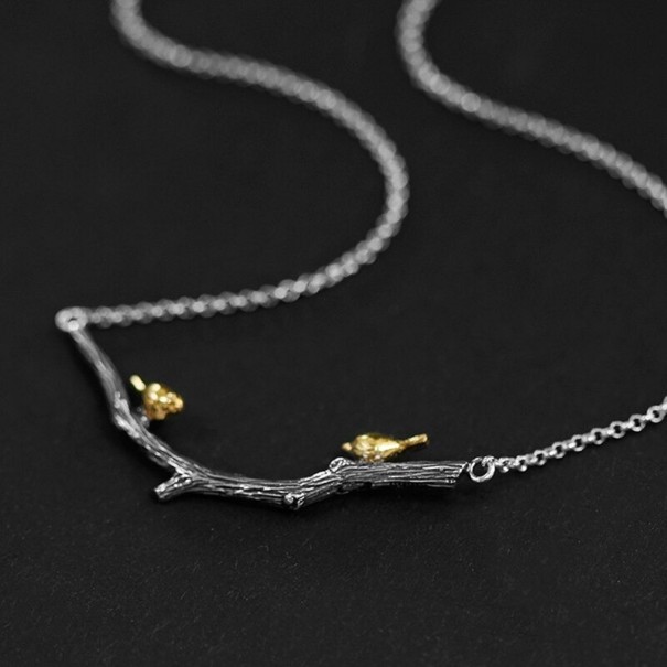 Dam halsband kvist med fåglar 1