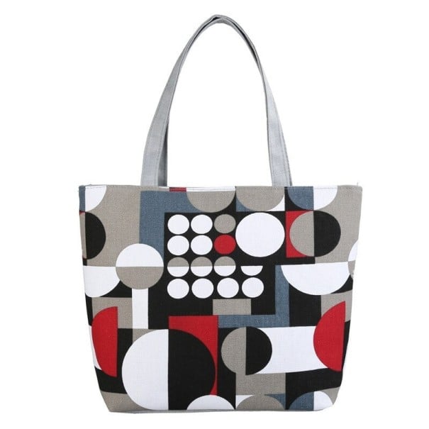 Dame lærred taske med geometrisk mønster af cirkler Lærred og polyester Dimensioner 42 x 30 x 10 cm Lange grå håndtag Rummelig taske til byen 1