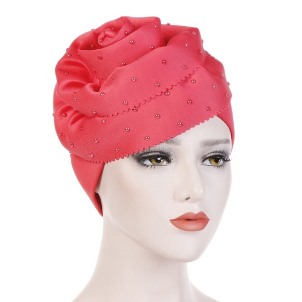 Damehue med rose koralfarvet