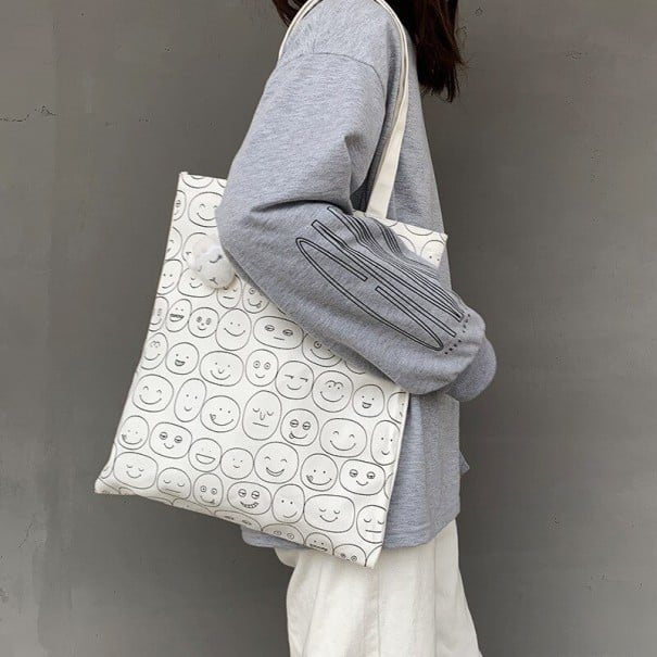Damen Baumwolltasche über der Schulter mit ganzflächigem Muster aus gezeichneten lächelnden Gesichtern Zwei lange Henkel Einkaufstasche 34 x weiß