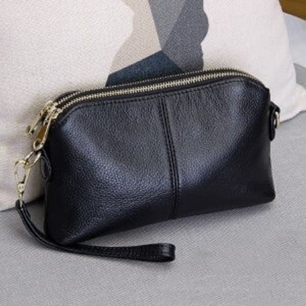 Damen Crossbody Tasche mit Reißverschluss Zwei Reißverschlussfächer Abgerundete Form Strukturierte Oberfläche Gurt mit metallischen schwarz S