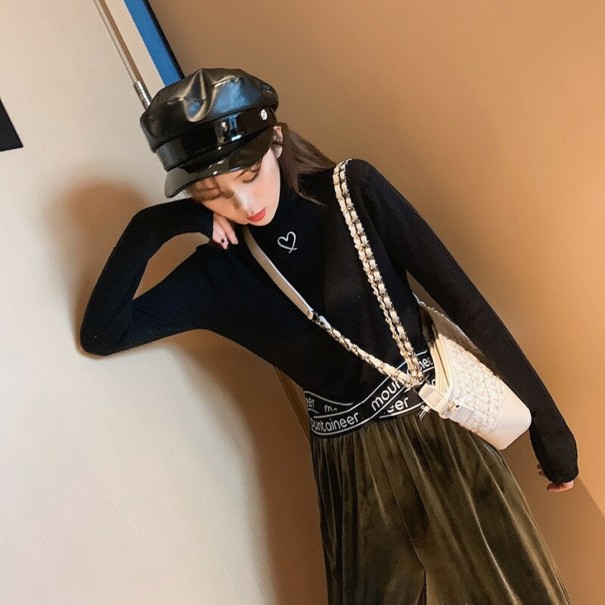 Damen-Rollkragenpullover mit Herz schwarz