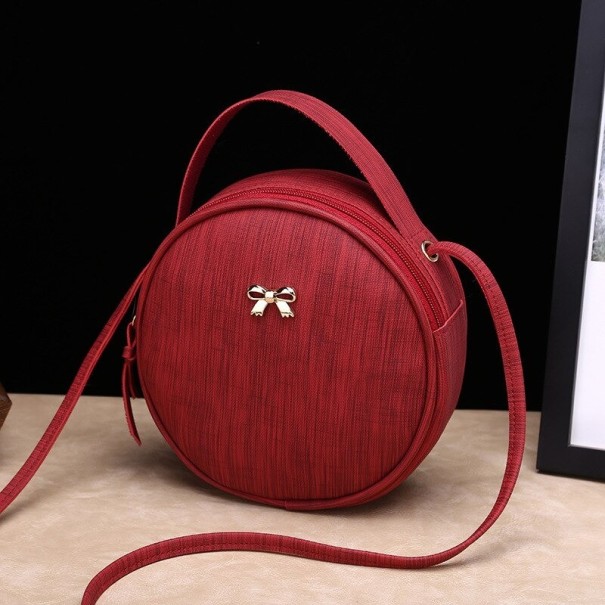 Damen Runde Crossbody Tasche mit Griff Metallische Schleife Reißverschluss Dünner Schulterriemen PU Leder und Polyester 19 x 19 x 6 cm weinrot