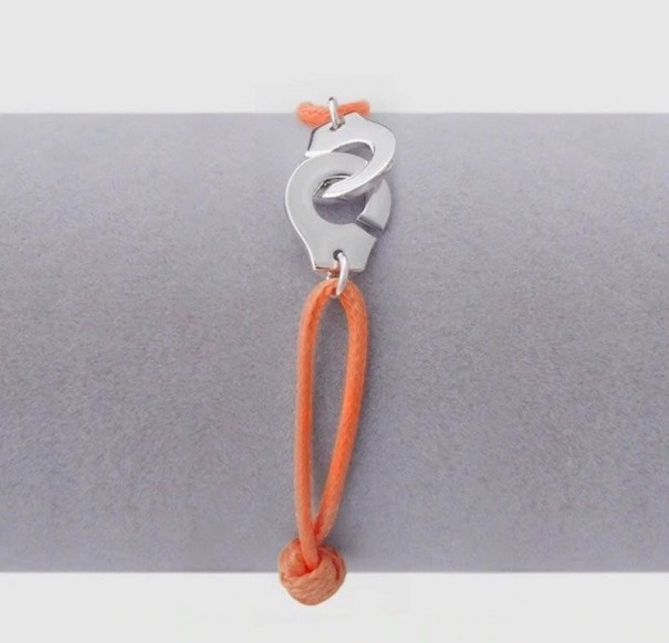 Damenarmband mit Handschellen orange