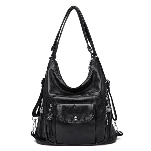 Damentasche aus Kunstleder mit geflochtenem Griff, Vordertasche mit Klappe, senkrechte Reißverschlusstaschen, dekorative Anhänger, Maße 32 schwarz