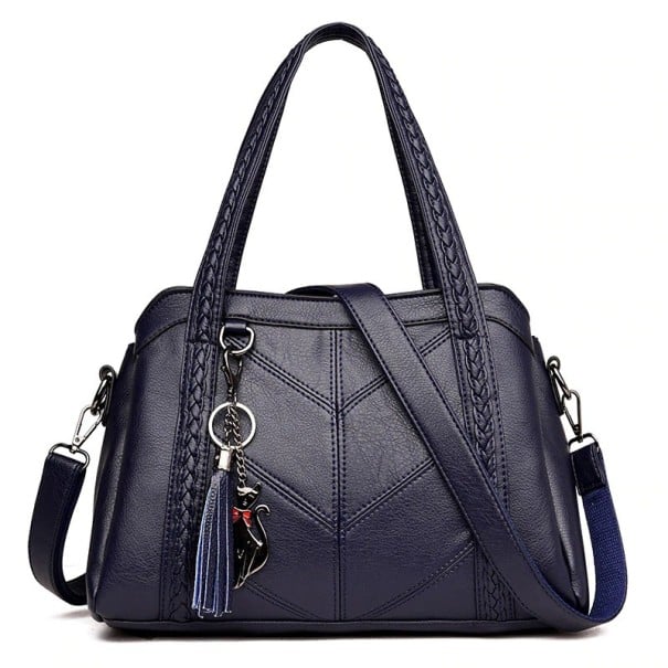 Damentasche für die Hand und über die Schulter aus PU-Leder Zwei Griffe mit geflochtenem Dekor Abnehmbarer Gurt Anhänger mit Quaste Maße 31 dunkelblau