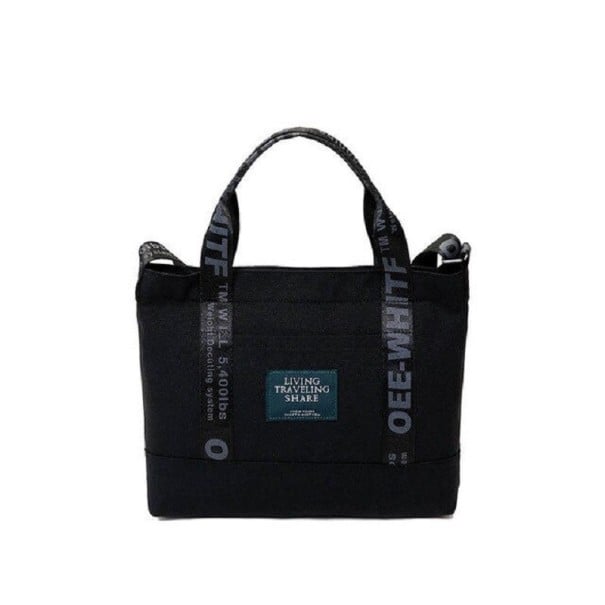 Dames canvas handtas 32 x 25 x 6 cm Tas met twee handvaten van bedrukte banden Label aan de voorkant Canvas en polyester zwart