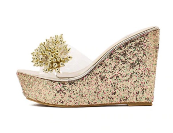 Dames glitterpantoffels op een hoog platform met decoratie goud 35
