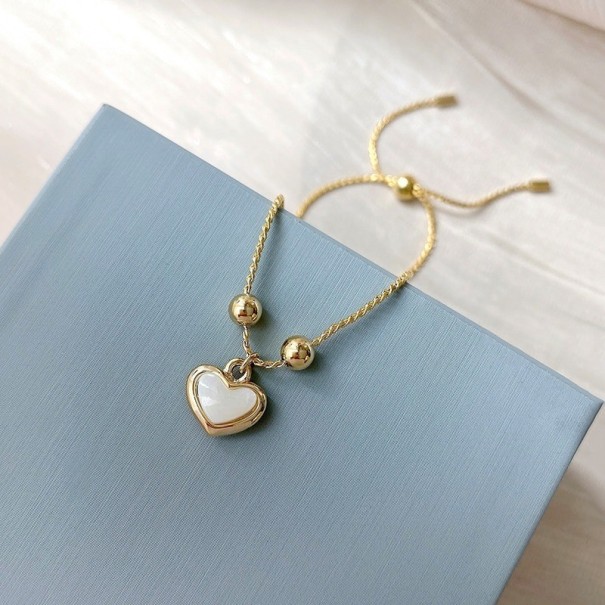 Dames hart armband goud